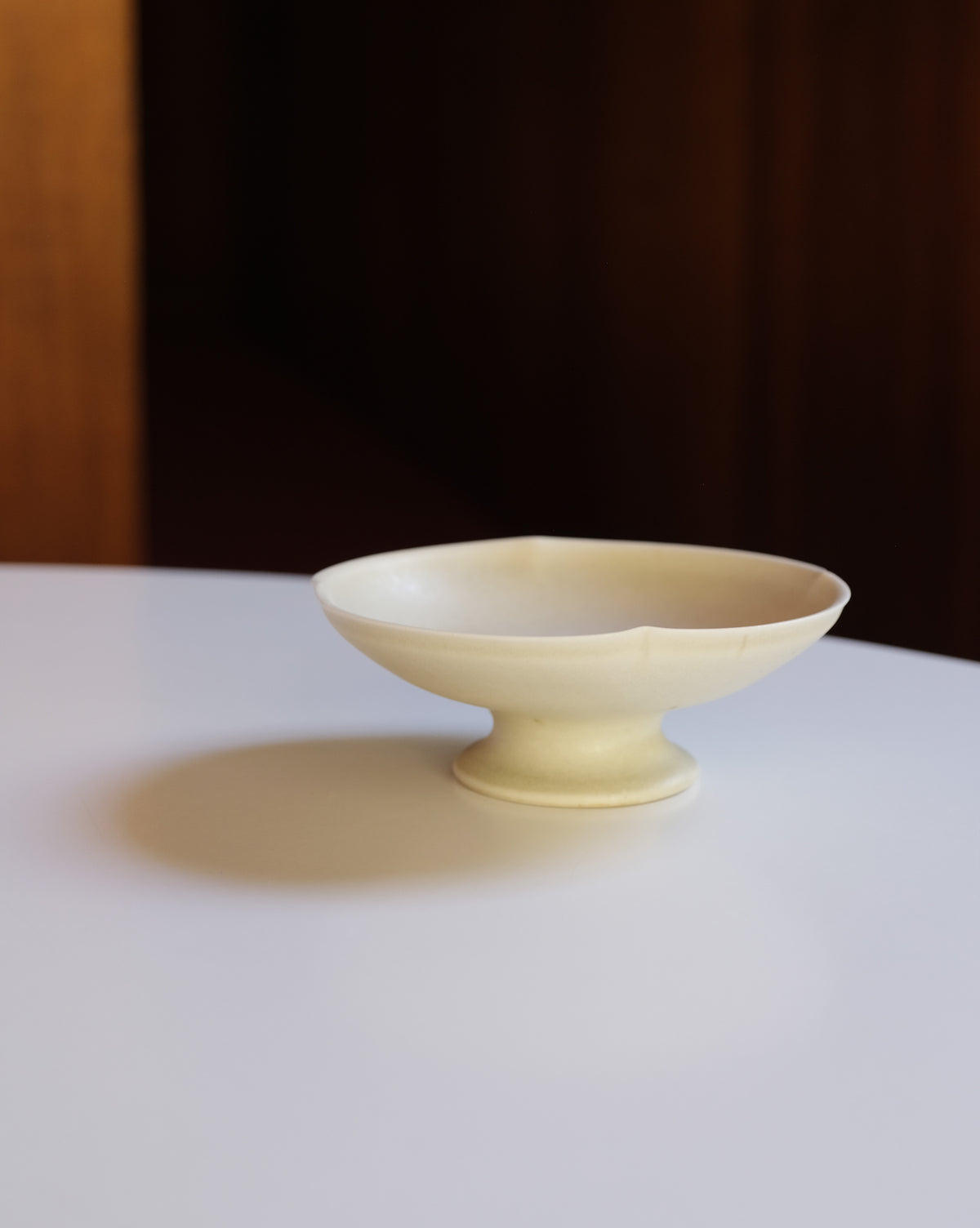 PINCHED FOOTED PLATE